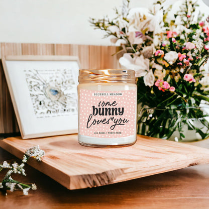 Bluebell Meadow Candle by Gia Roma, pink dotted label glass jar candle on wooden tray on Tampa Home & Garden Store
