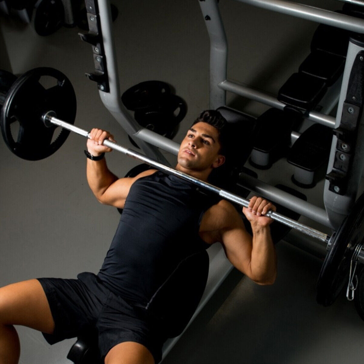 DirectDeals 1000 lbs weight lifting barbell for bench press in use by man in gym on Tampa Home & Garden Store