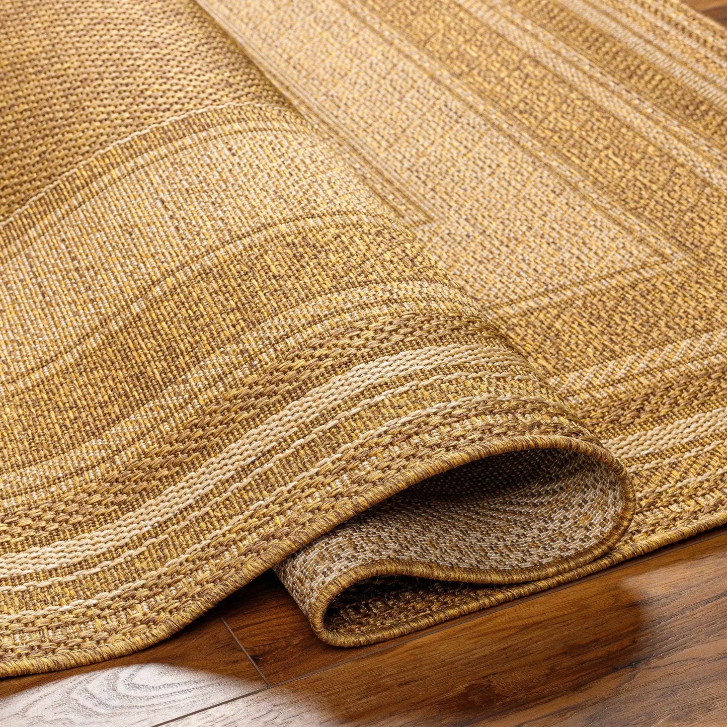 Chael Flatweave Faux Jute Outdoor Rug natural tan woven texture Boutique Rugs on Tampa Home & Garden Store