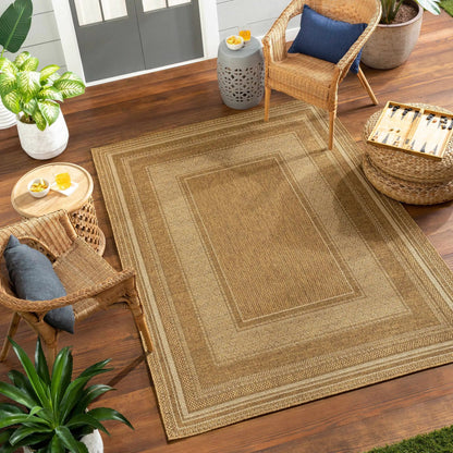 Chael flatweave faux jute outdoor rug natural beige under wicker seats on Tampa Home & Garden Store