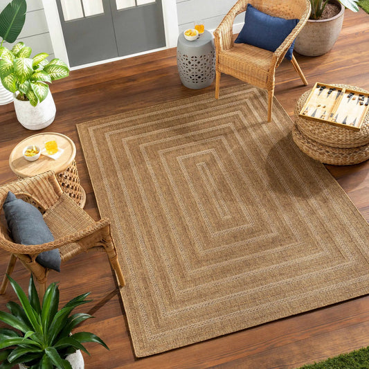 Dyami Flatweave Faux Jute Outdoor Rug in natural beige for patios and decks on Tampa Home & Garden Store