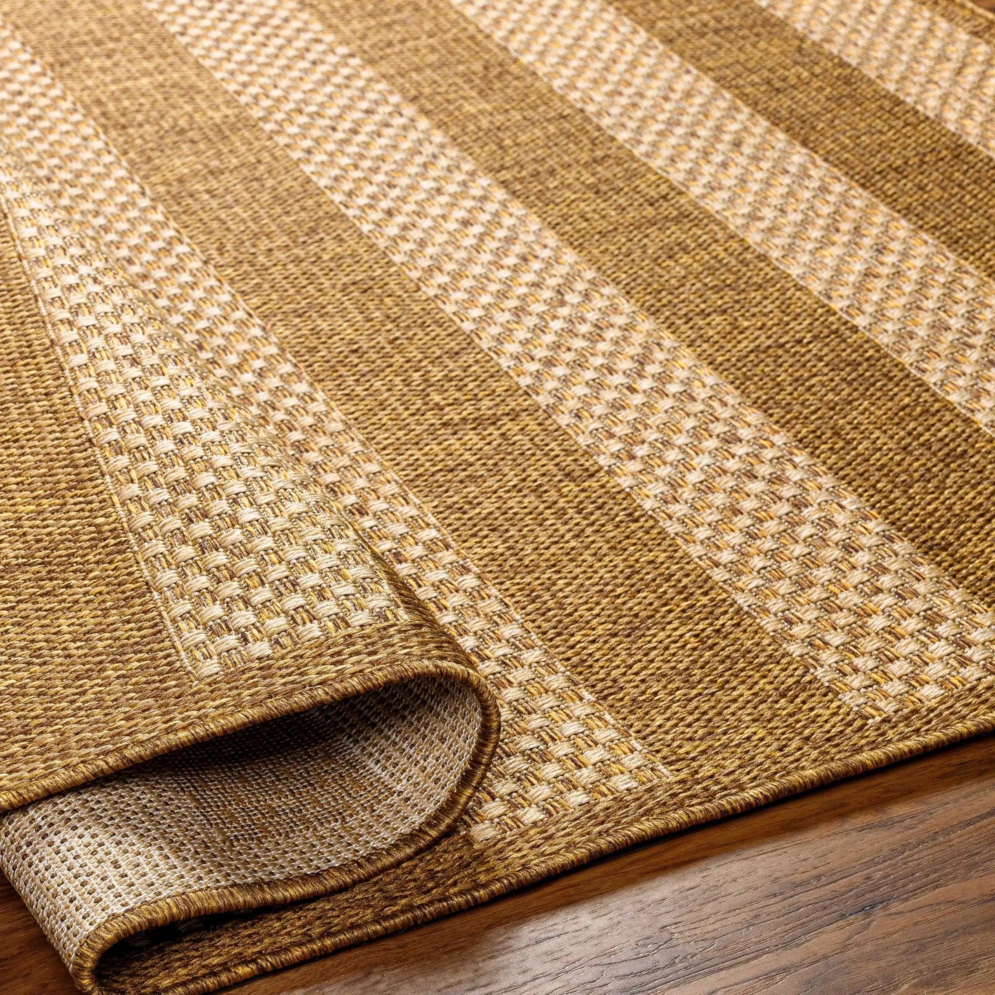 Hiero flatweave faux jute outdoor rug in natural beige tones on Tampa Home & Garden Store