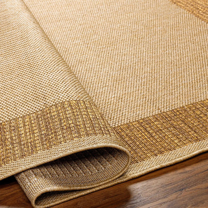 Inigo Flatweave Faux Jute Outdoor Rug natural beige; rolled and stacked (3) on Tampa Home & Garden Store