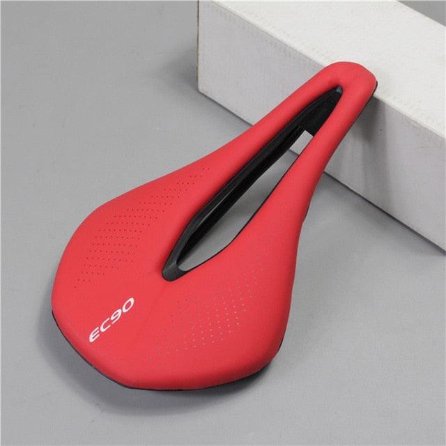 Stevvex sport bicycle saddle red with central cutout, perforated PU cover and EC90 logo on Tampa Home & Garden Store
