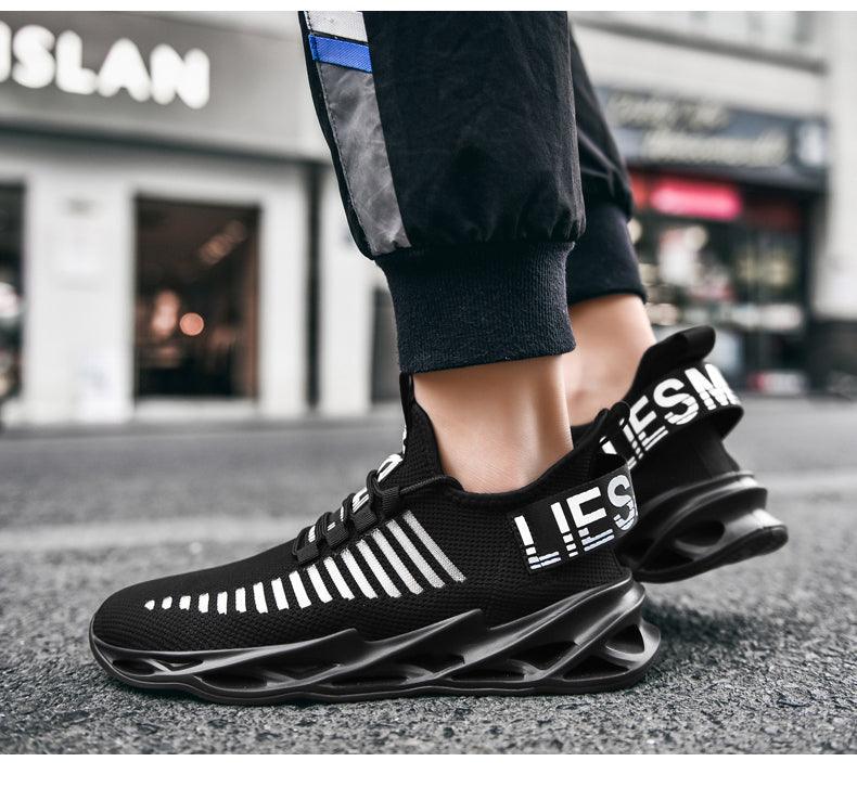 Men's black Stevvex sport sneakers with breathable knit upper and sculpted blade sole on Tampa Home & Garden Store