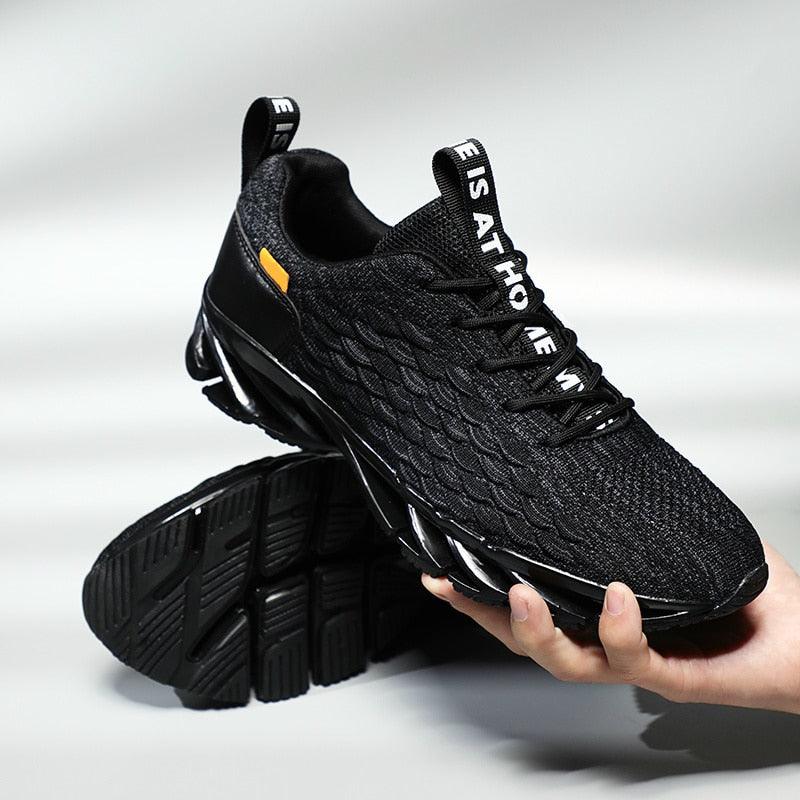Stevvex men's running sneakers with black knit upper and yellow heel tab non-slip outsole on Tampa Home & Garden Store