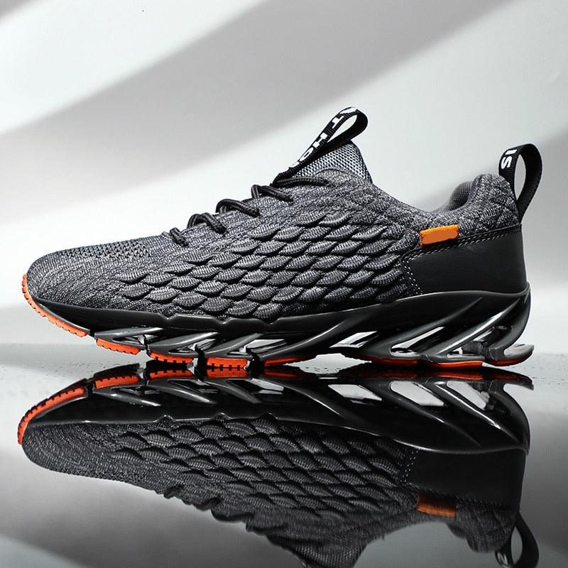 Stevvex men's sport running sneaker gray knit upper with black sculpted sole and orange accents on Tampa Home & Garden Store