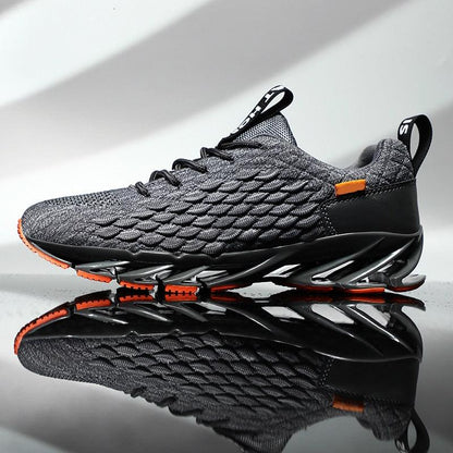Stevvex men's sport running sneaker gray knit upper with black sculpted sole and orange accents on Tampa Home & Garden Store