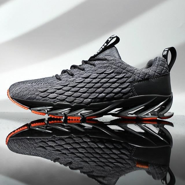 Stevvex men's athletic running sneakers with grey knit upper and black sole orange accents on Tampa Home & Garden Store