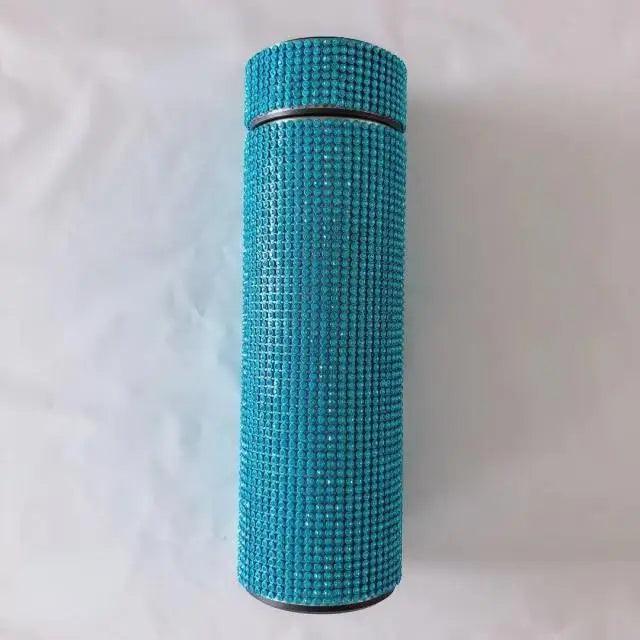 Turquoise diamond-pattern stainless steel thermos bottle with screw cap on Tampa Home & Garden Store