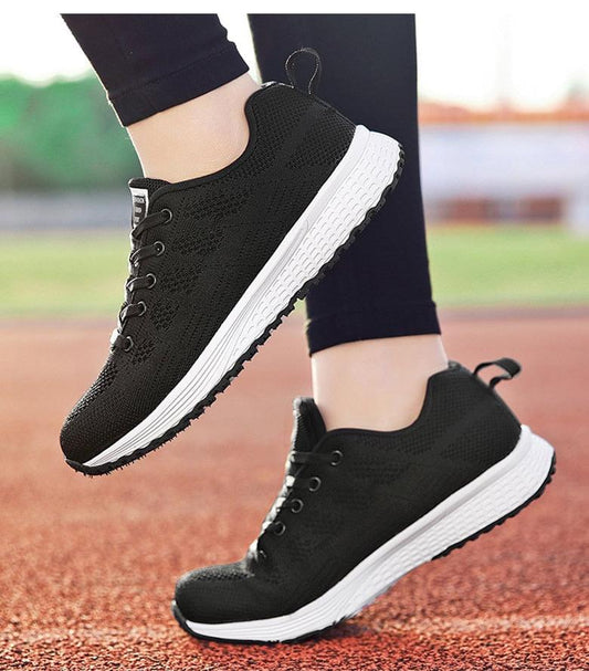 Stevvex black breathable mesh sneakers pair with white cushioned sole for women casual walking on Tampa Home & Garden Store