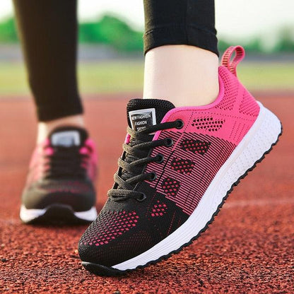 Stevvex women's breathable mesh sneakers, pink and black, two shoes on track on Tampa Home & Garden Store