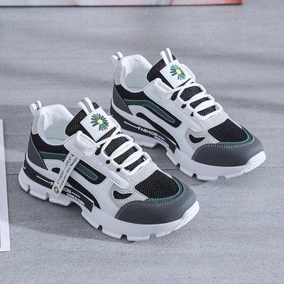 Stevvex athletic sneakers pair with breathable mesh upper in white and gray with platform sole on Tampa Home & Garden Store