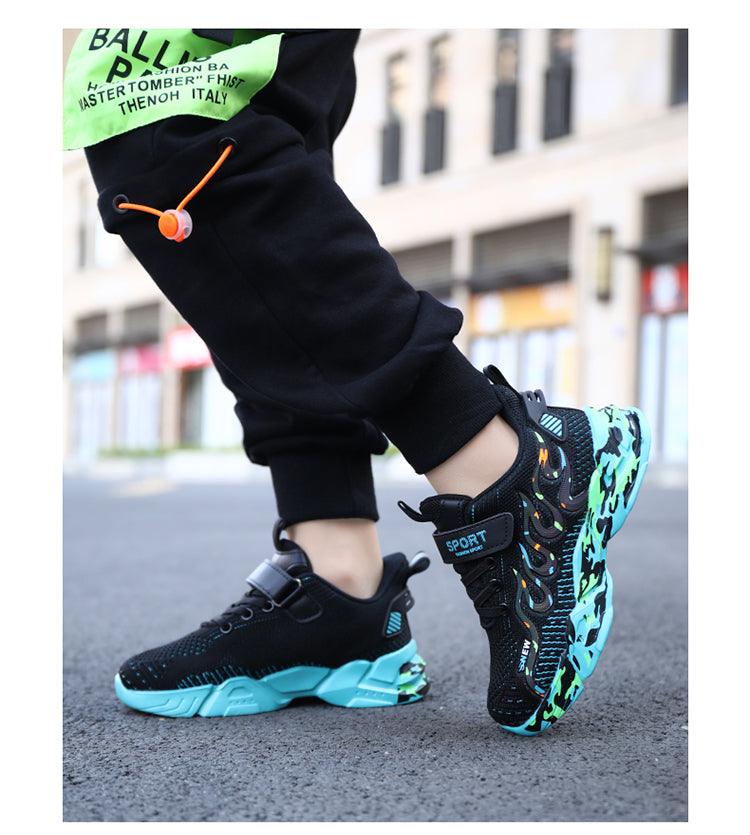 Stevvex kids' breathable mesh sneakers pair with turquoise outsole and camo side pattern on Tampa Home & Garden Store