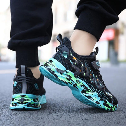 Stevvex pair of kids' breathable mesh sneakers with black upper and teal camo sole on Tampa Home & Garden Store