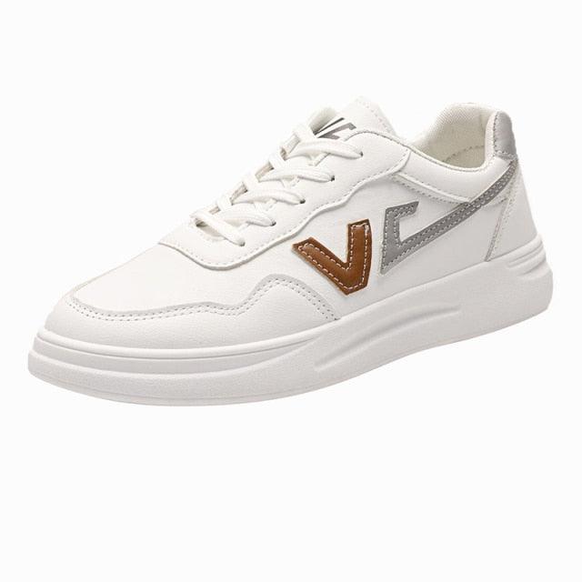 Stevvex women's white leather platform sneaker with lace-up front and brown/gray side patches on Tampa Home & Garden Store