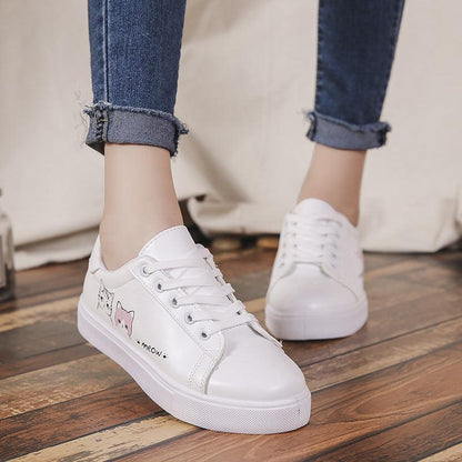 Stevvex white PU leather platform sneakers with lace-up and cat graphics on side on Tampa Home & Garden Store