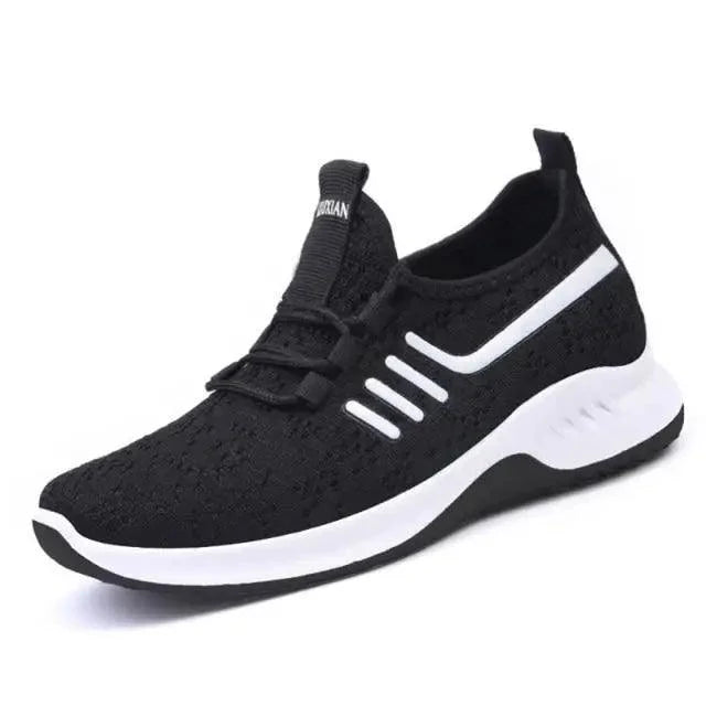 Stevvex Spring Flat Women's Sneakers black mesh upper with white sole and side stripes on Tampa Home & Garden Store