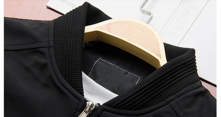 Spring men's lightweight jacket with ribbed knit collar and zipper on a hanger on Tampa Home & Garden Store