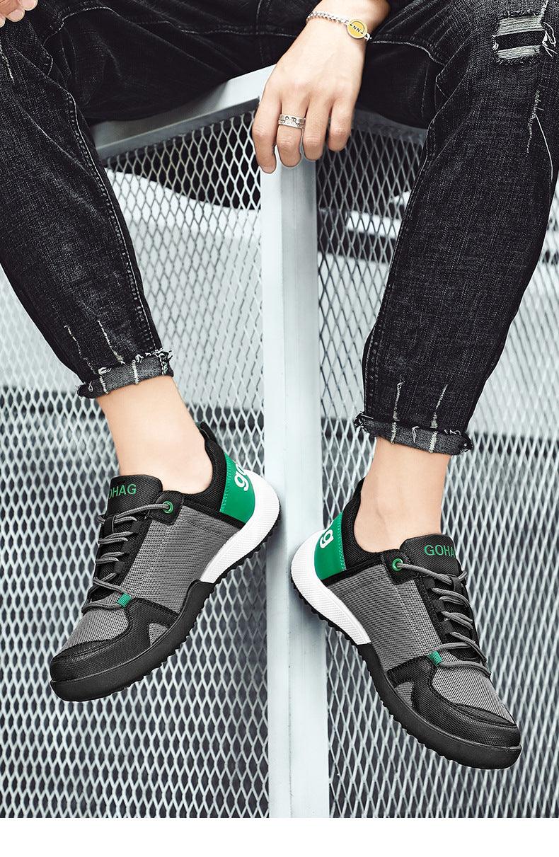 Stevvex men's sneakers gray mesh upper with green heel tab and white sole pair shown on Tampa Home & Garden Store