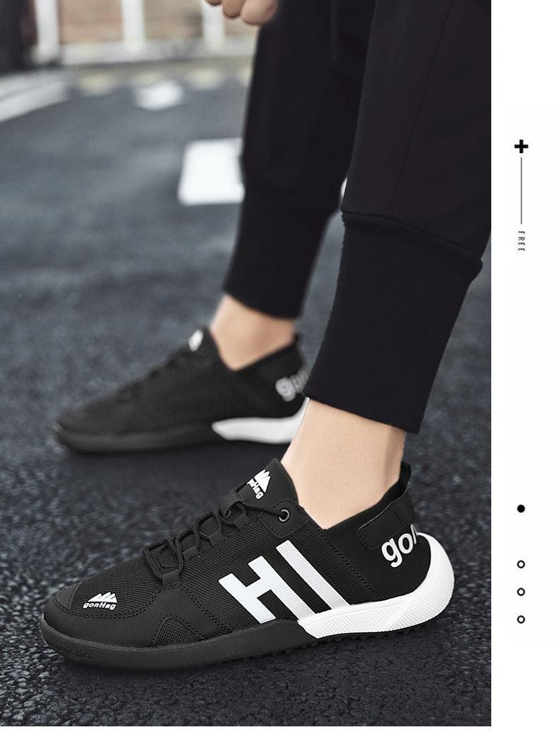 Stevvex men's black mesh sneakers with white chunky midsole side logo detail on Tampa Home & Garden Store