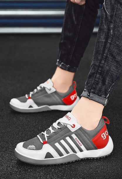 Stevvex grey mesh sneakers with white stripes and red heel tab, lightweight casual shoes pair on Tampa Home & Garden Store
