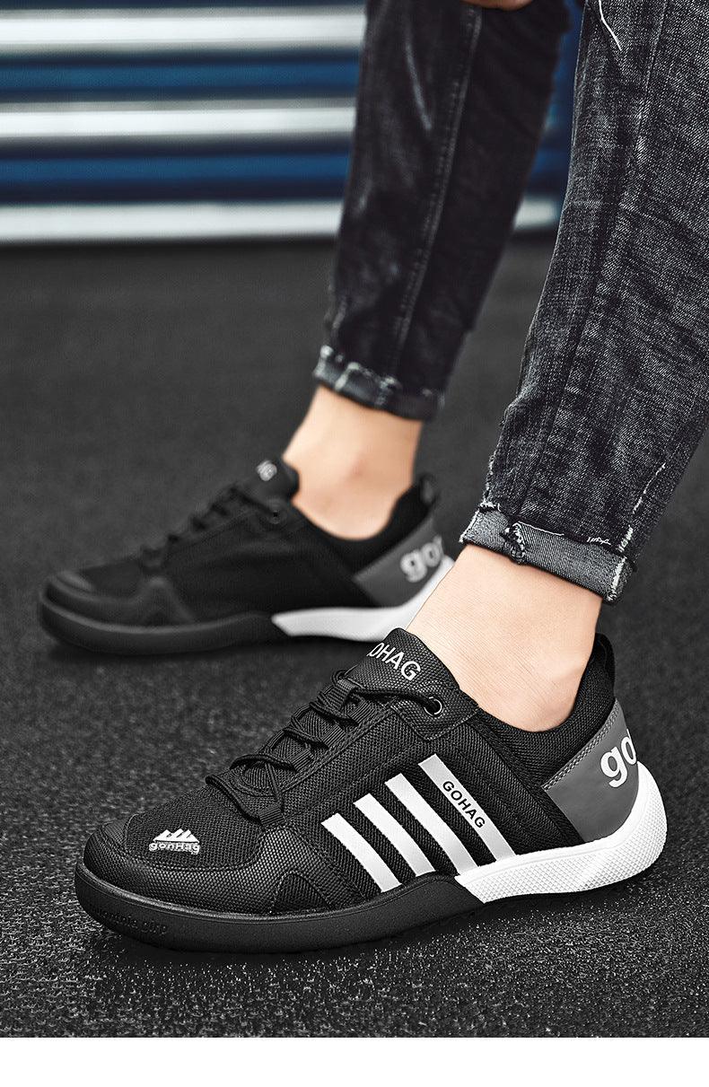 Stevvex black mesh sneakers with white three-stripe design, grey heel panel, cushioned sole on Tampa Home & Garden Store