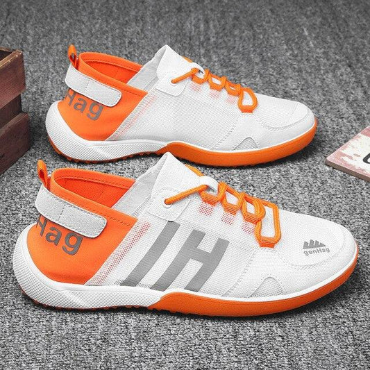 Stevvex ST85SH5500REH sneakers pair, white mesh upper with orange accents and orange sole on Tampa Home & Garden Store