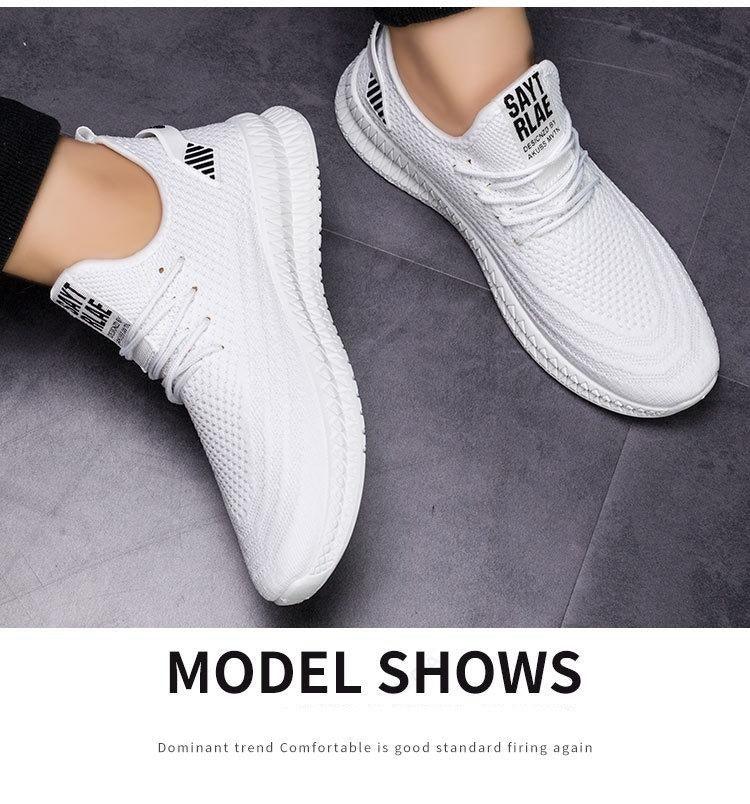Stevvex white mesh running sneakers, lightweight lace-up casual walking shoes for men, pair on Tampa Home & Garden Store