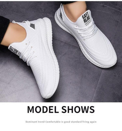 Stevvex white mesh running sneakers, lightweight lace-up casual walking shoes for men, pair on Tampa Home & Garden Store