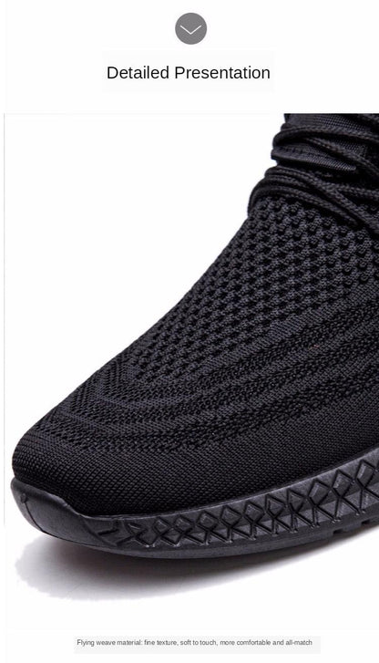 Black knit mesh men's sneakers with sock-like collar and textured sole, close-up toe view on Tampa Home & Garden Store
