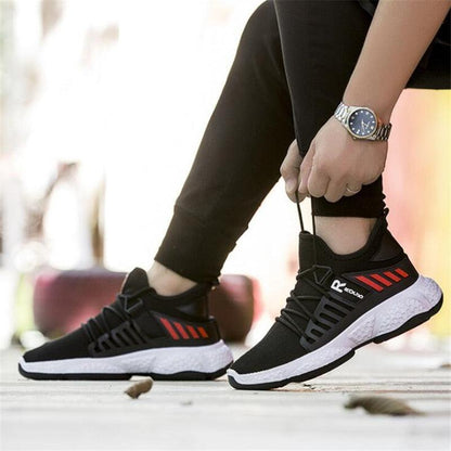 Stevvex men's black mesh sneakers with red side accents and white sole on Tampa Home & Garden Store