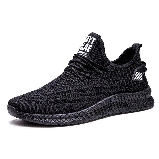 Stevvex men's black mesh sneakers with knit upper, lace-up, cushioned textured midsole on Tampa Home & Garden Store