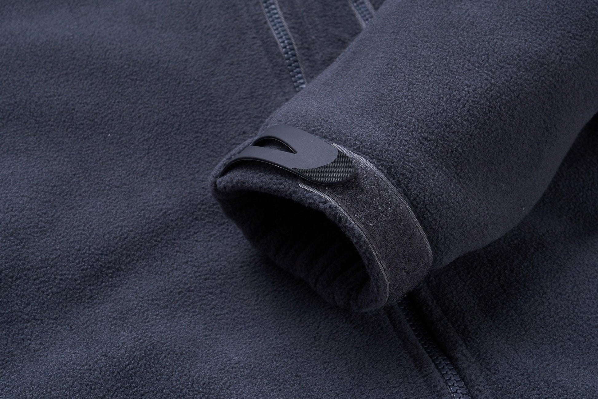 Fleece jacket navy by Stevvex with front zipper and cuff strap closeup on Tampa Home & Garden Store