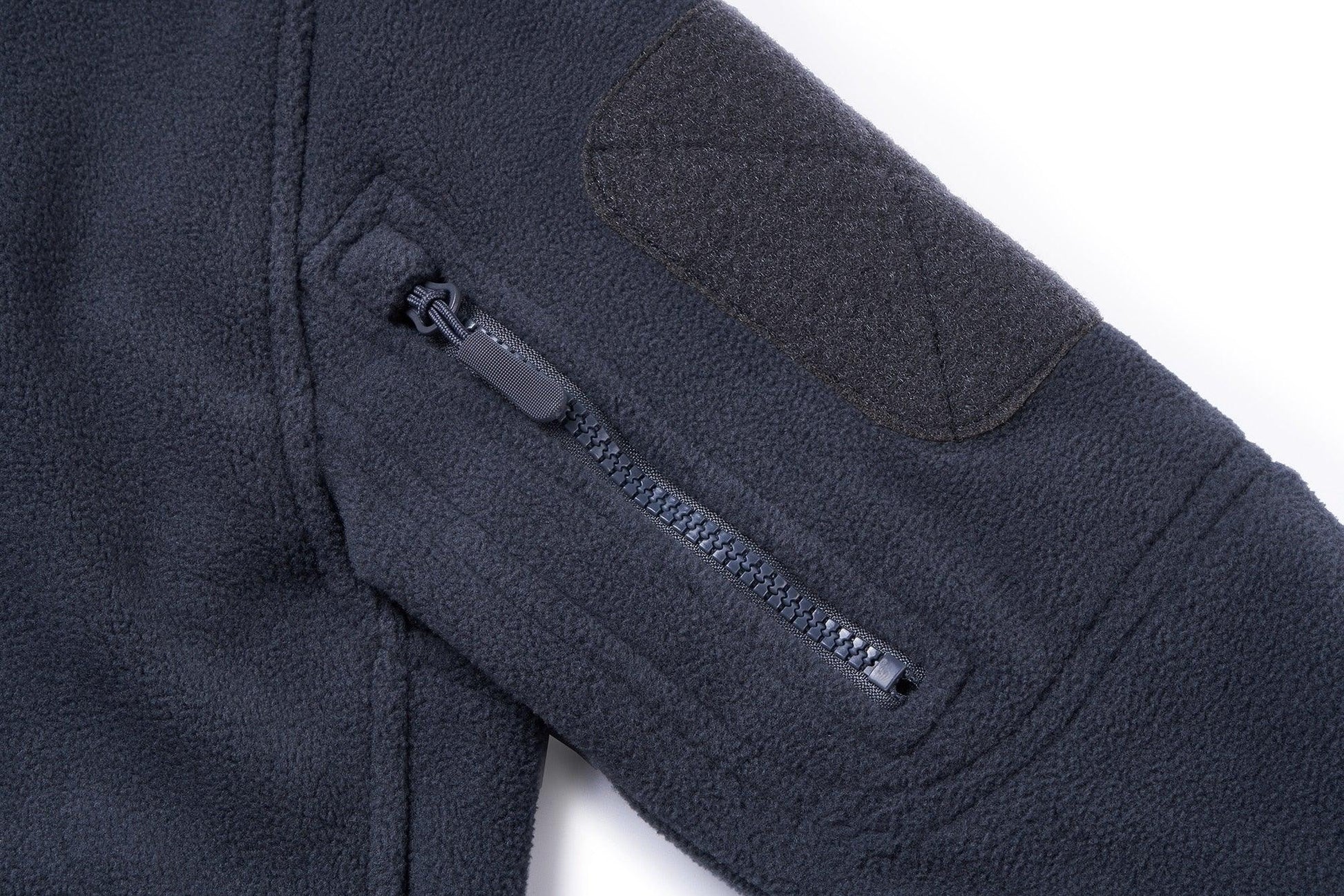 Dark navy fleece jacket with front zipper and reinforced shoulder patch on textured fabric on Tampa Home & Garden Store