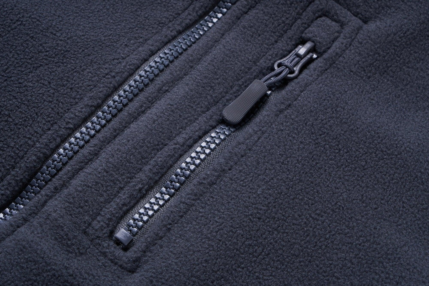 Stevvex men's fleece jacket zipper close-up on dark navy fleece fabric on Tampa Home & Garden Store