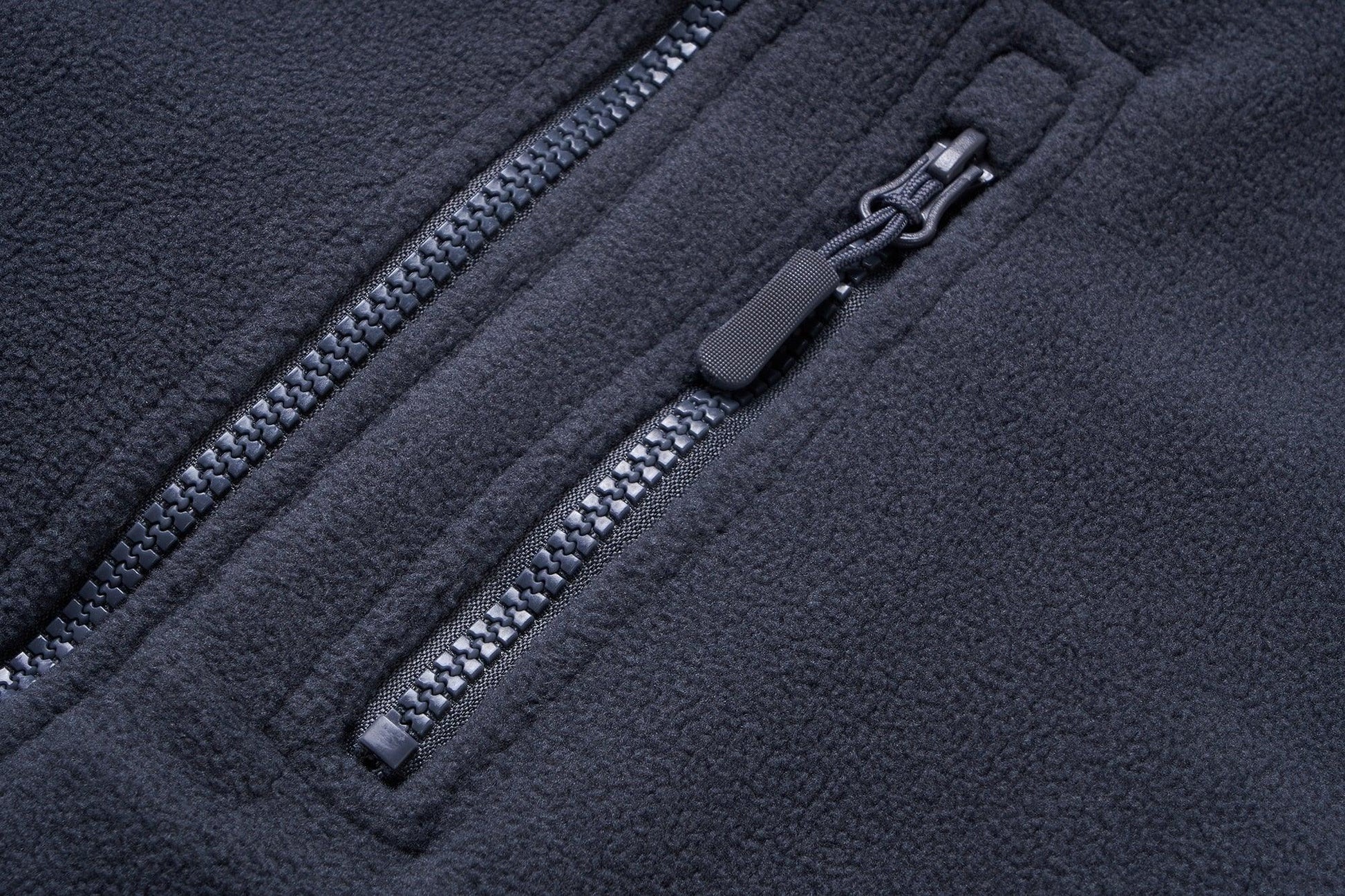 Stevvex men's fleece jacket zipper close-up on dark navy fleece fabric on Tampa Home & Garden Store