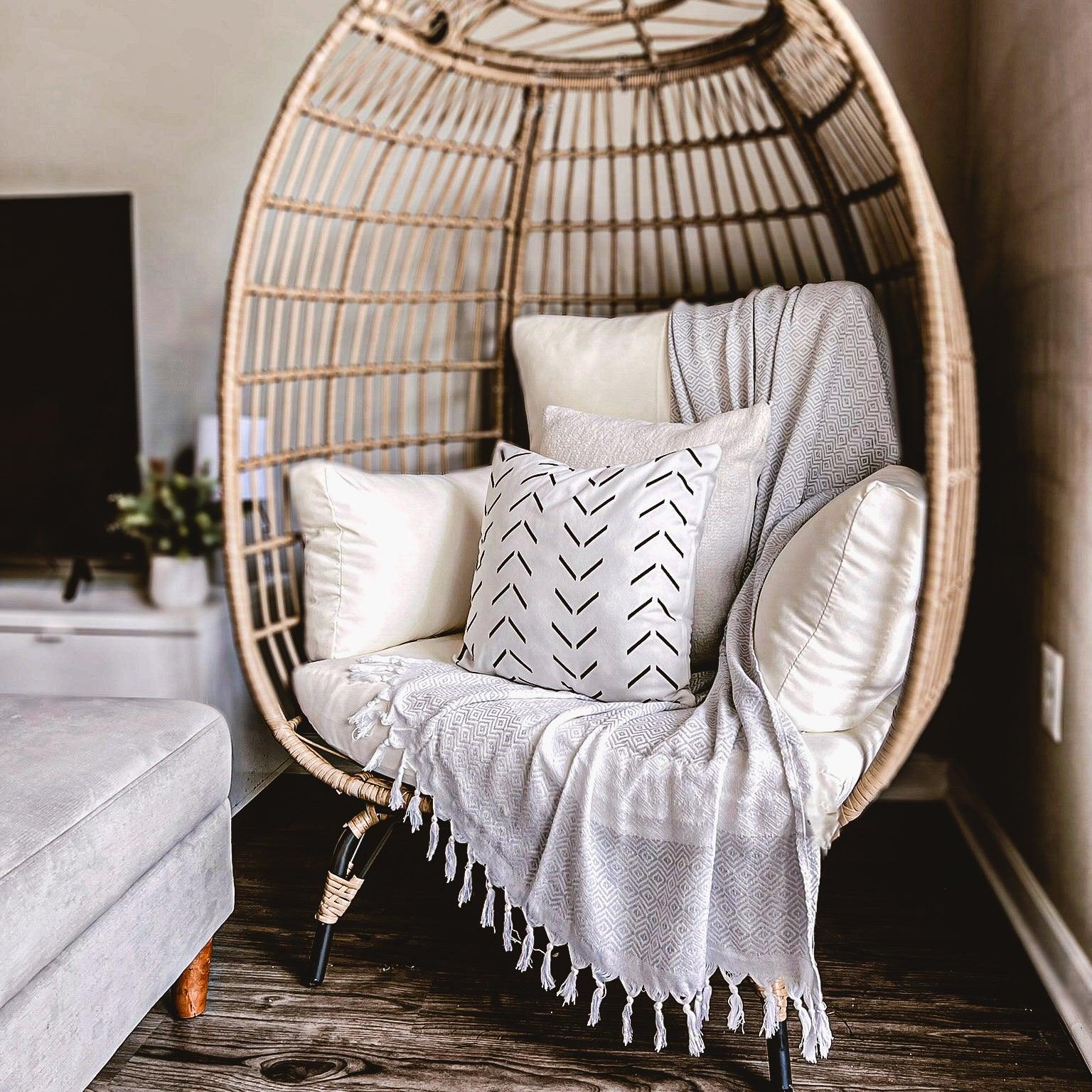 Haley Diamond Towel 200GSM by Gia Roma in soft grey with fringe on a wicker chair on Tampa Home & Garden Store