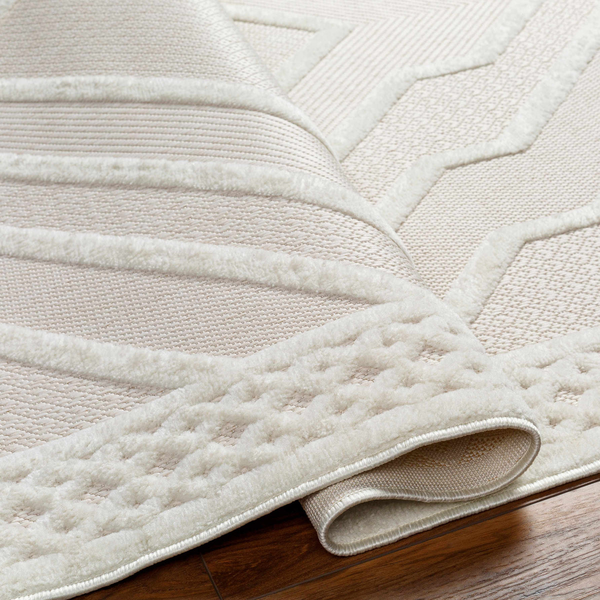 Anja Cream Outdoor Rug, cream-toned outdoor rug with plush border and textured weave on Tampa Home & Garden Store
