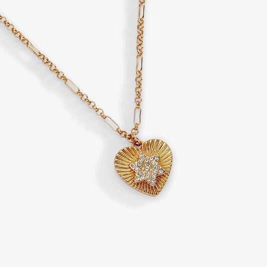 Gold-tone sunburst heart pendant necklace with crystal accents on a chain on Tampa Home & Garden Store