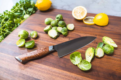 6-inch Chef Knife STEELPORT Knife Co on a wooden cutting board with Brussels sprouts and citrus on Tampa Home & Garden Store
