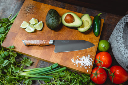 STEELPORT 6in chef knife with burl wood handle on a cutting board beside avocado and lime wedges on Tampa Home & Garden Store