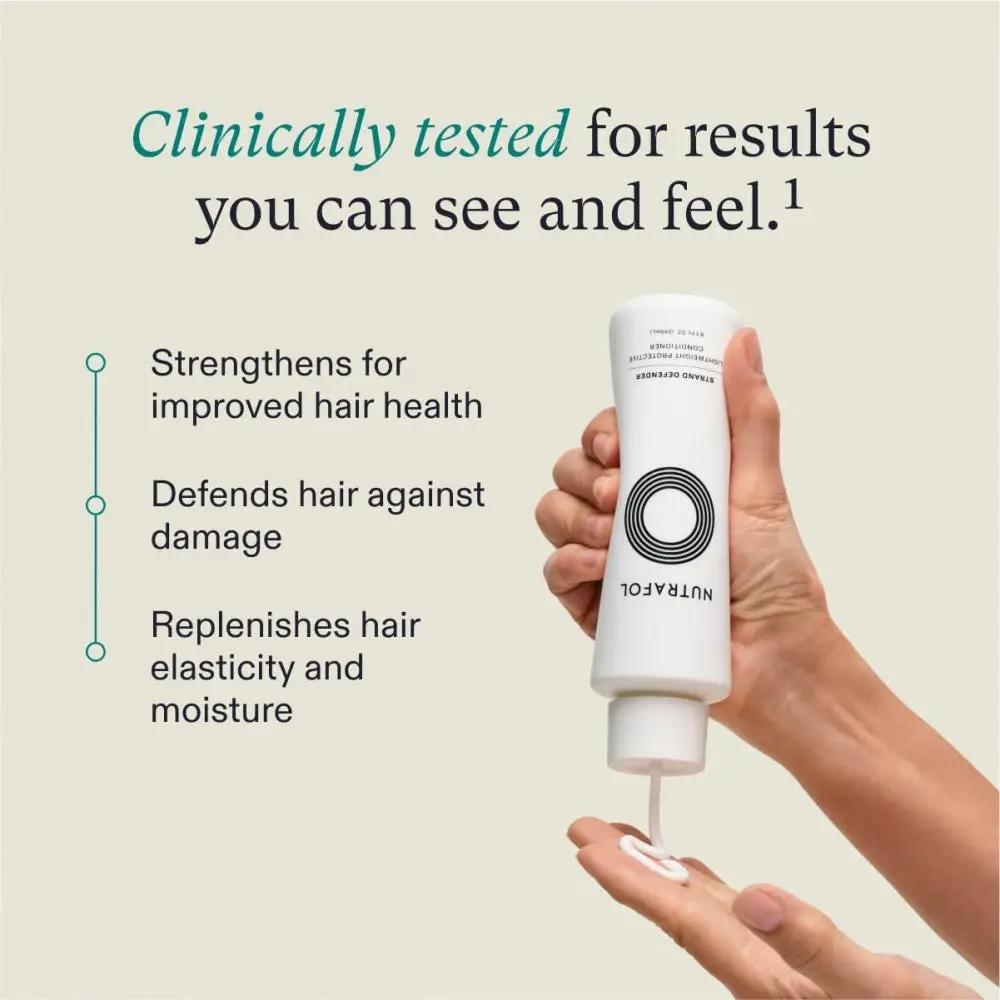 Nutrafol Strand Defender Lightweight Protective Conditioner bottle, white logo, dispensed on Tampa Home & Garden Store