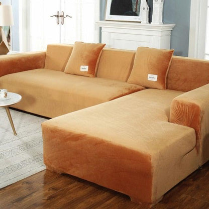 Stretchable orange-brown sofa slipcover on L-shaped sectional with chaise for living room on Tampa Home & Garden Store