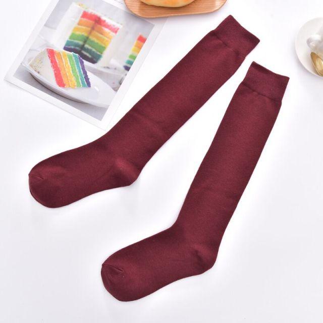 Pair of burgundy thigh-high stockings, plain knit tube socks for casual wear on Tampa Home & Garden Store