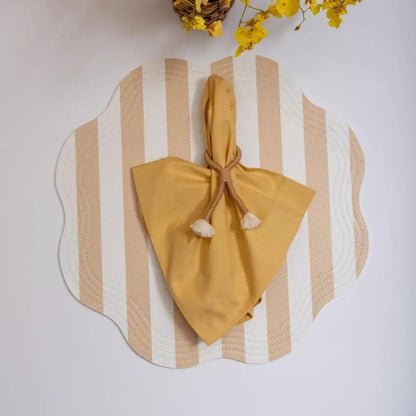 Nautical Knot Napkin Ring Holder with tan napkin tied on beige striped coastal wall decor on Tampa Home & Garden Store