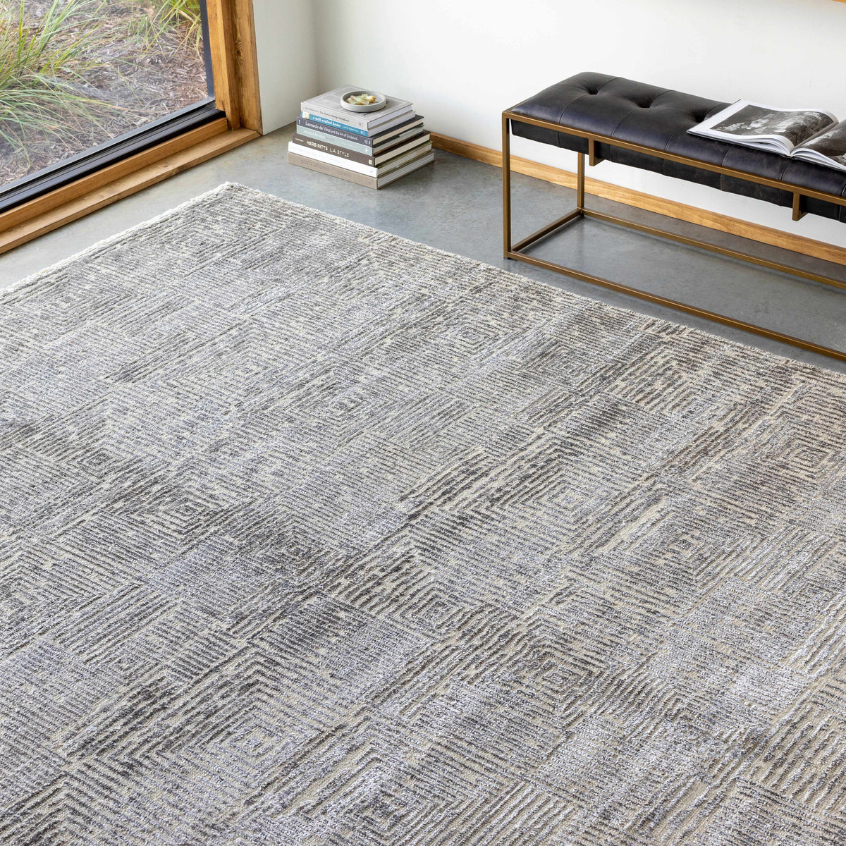 Struie Area Rug by Boutique Rugs in a gray textured chevron pattern on Tampa Home & Garden Store