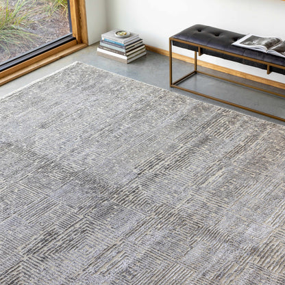 Struie Area Rug by Boutique Rugs in a gray textured chevron pattern on Tampa Home & Garden Store