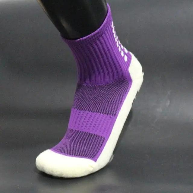Stevvex athletic sock purple with ribbed cuff and breathable knit on foot model on Tampa Home & Garden Store