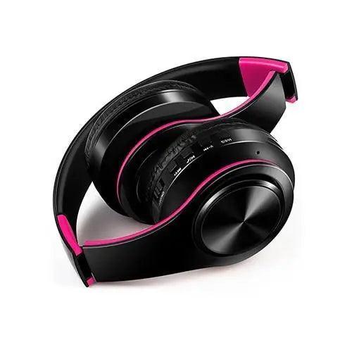 Stevvex over-ear wireless Bluetooth headphones with pink trim, foldable design on Tampa Home & Garden Store